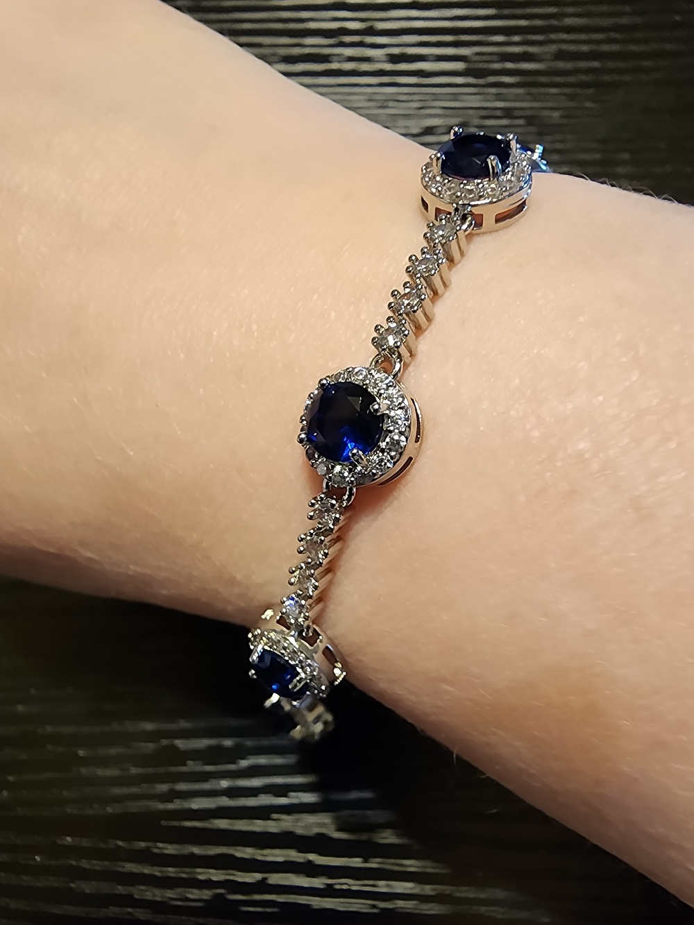 Silver Bracelet with Deep Blue Sapphire Halo Stones